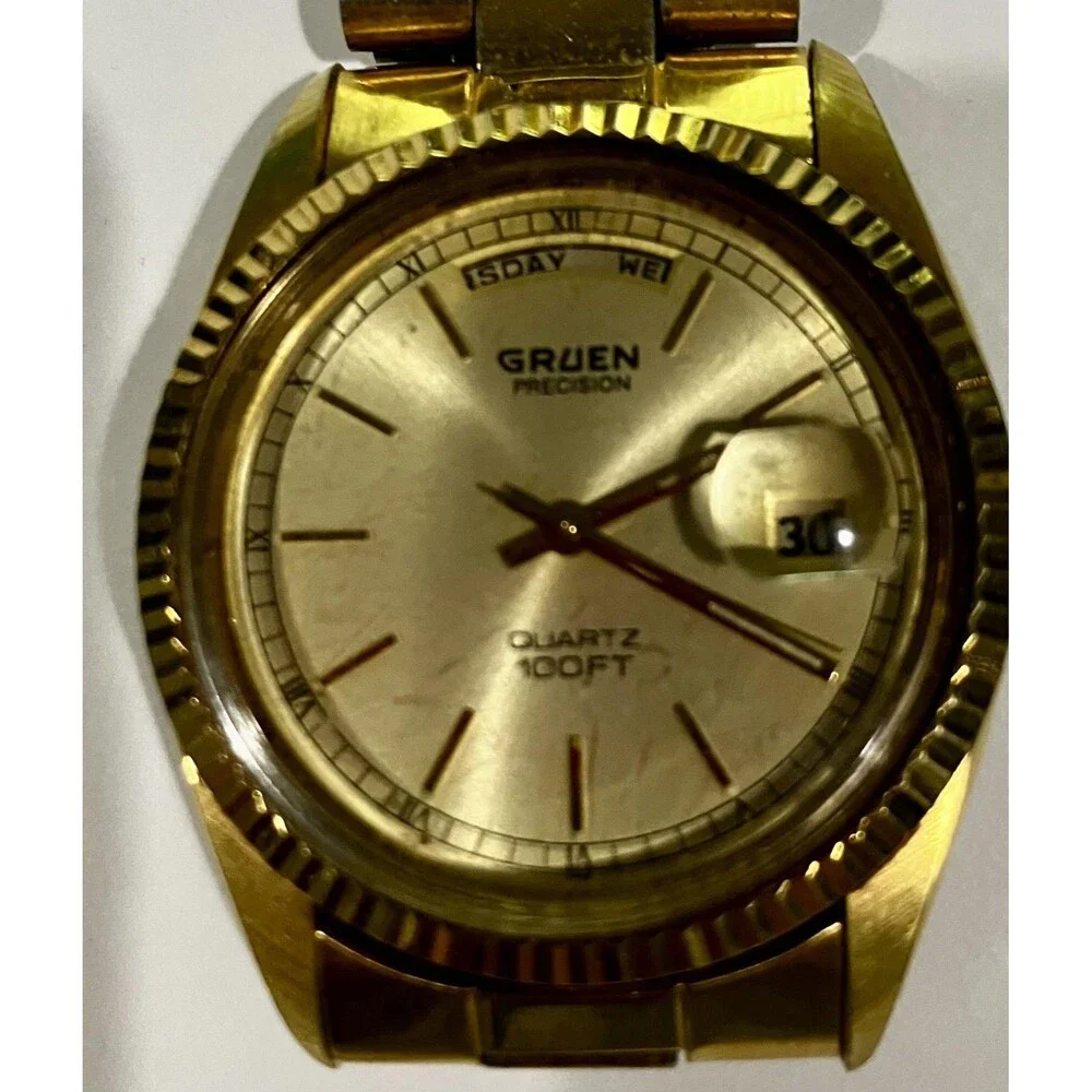 Gruen Watch Gold Dial Gold Tone Bracelet Quartz Day Date 100FT Needs Battery